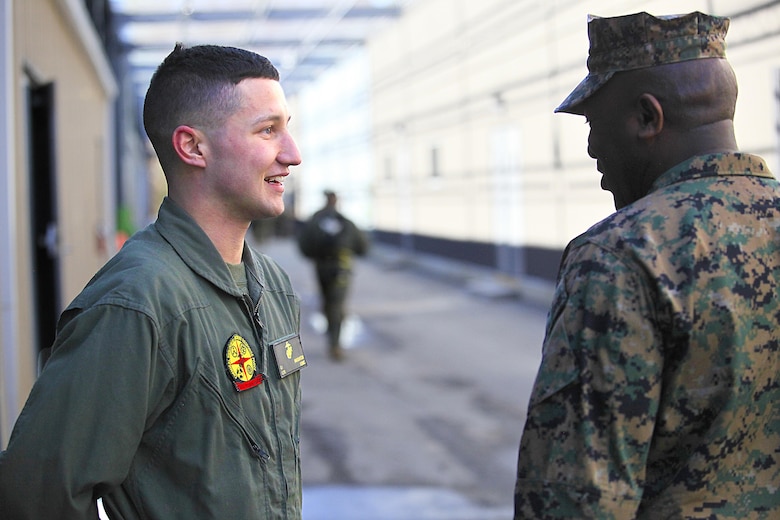 Manhattan, Kan. - native Lance Cpl. Gunnar I. Naughton, a team member with Identification Platoon, React Force Company, Chemical Biological Incident Response Force (CBIRF), listens to Sgt. Maj. Ronald L. Green, the 18th Sergeant Major of the Marine Corps, during Green’s tour of Raymond M. Downey Responder Training Facility, Naval Annex Stump Head, Md., Feb. 18, 2016.
Green visited the Marines, sailors and civilians with CBIRF at Naval Support Facility Indian Head and Raymond M. Downey Responder Training Facility.
During Green’s visit, he received a CBIRF brief given by the CBIRF Commanding Officer, Col. Stephen E. Redifer, viewed a static display of an Initial Response Force set-up, talked to CBIRF personnel, toured the Downey Responder Training Facility and had lunch with CBIRF staff noncommissioned officers. 
When directed, CBIRF forward-deploys and/or responds with minimal warning to a chemical, biological, radiological, nuclear or high-yield explosive (CBRNE) threat or event in order to assist local, state, or federal agencies and the geographic combatant commanders in the conduct of CBRNE response or consequence management operations, providing capabilities for command and control; agent detection and identification; search, rescue, and decontamination; and emergency medical care for contaminated personnel. (Official USMC Photo by Sgt. Santiago G. Colon Jr./RELEASED)
