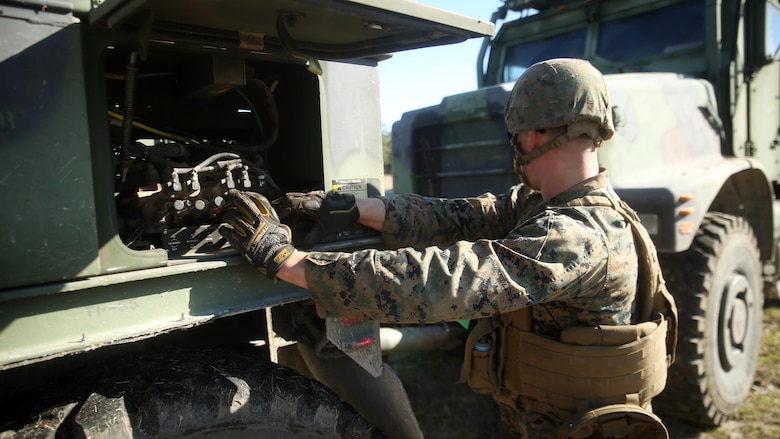 Cpl. Gunnar Bontjes, an MK36 Wrecker operator with Combat Logistics Battalion 6, operates a Wrecker during a convoy operations exercise at Camp Lejeune, N.C., Feb. 11, 2016. The Marines encountered opposing forces during the convoy and faced both small arms and indirect fire. (Official Marine Corps photo by Cpl. Joey Mendez/Released)
