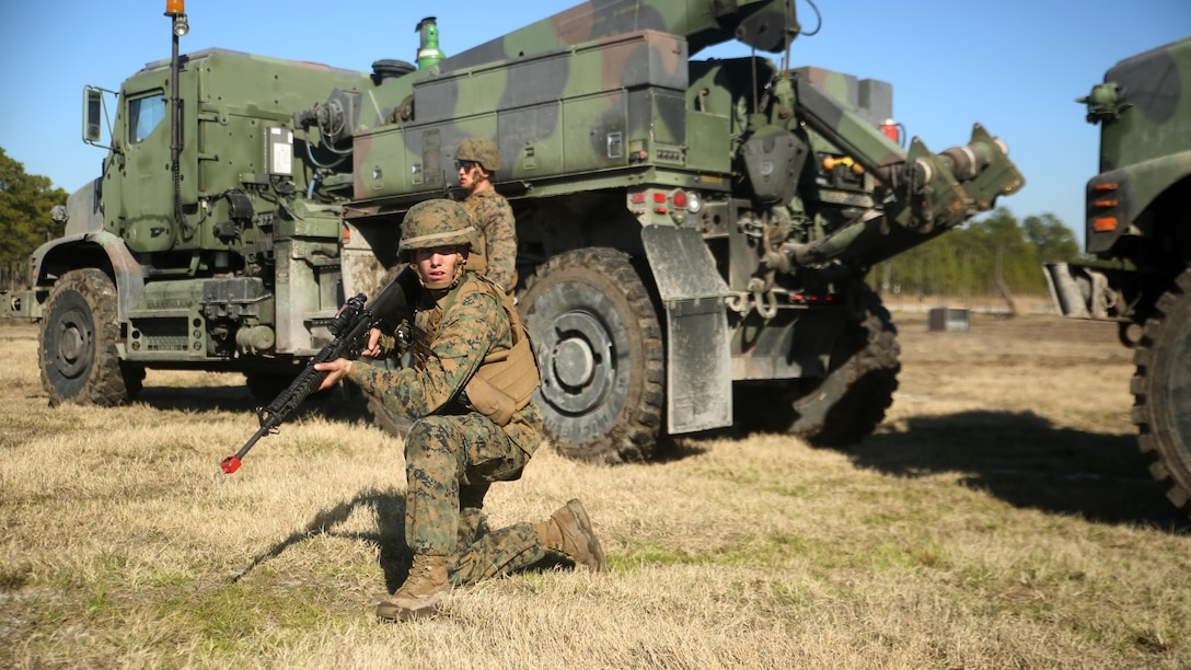 Lance Cpl. Brandon C. Waples, the recovery team leader with Combat Logistics Battalion 6, provides security for an MK36 Wrecker crew during a convoy operations exercise at Camp Lejeune, N.C., Feb. 11, 2016. The Marines encountered opposing forces during the convoy and faced both small arms and indirect fire. (Official Marine Corps photo by Cpl. Joey Mendez/Released)