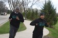 Army Reserve Sgt. 1st Class Terence Barron, left, and Sgt. 1st Class William Keys run in Sunset Meadows Park in Arlington Heights, Ill., during a 5k run/walk, coordinated by the 85th Support Command Sexual Harassment/Assault Response & Prevention Program (SHARP) team, April 22, 2015. The participants ran, despite 37-degree weather, to show their support for Sexual Assault Awareness Month. (Photo by Sgt. Aaron Berogan)