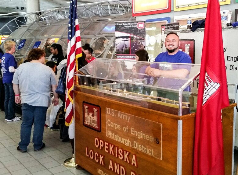 Jason Moats, Morgantown Lock and Dam operator, demonstrates the Opekiska Lock and Dam model during the Carnegie Science Center's Engineer the Future two-day event, Feb. 19-20