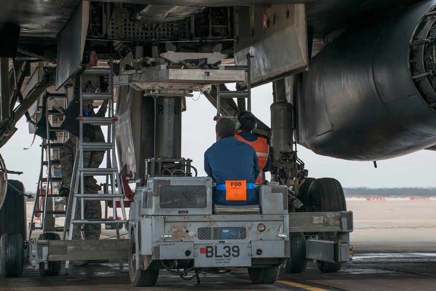 A weapons load crew assigned to the 489th Maintenance Squadron, prepares to download a Joint Air-to-Surface Standoff Weapon from the bomb bay of a B-1 Lancer during an exercise on Feb. 21, 2016, Dyess Air Force Base, Texas. Members of the Air Force Reserve Command’s 489th Bomb Group participated in the exercise alongside their Active Duty counterparts from the 7th Maintenance Squadron. (U.S. Air Force photo by Master Sgt. Greg Steele/Released)