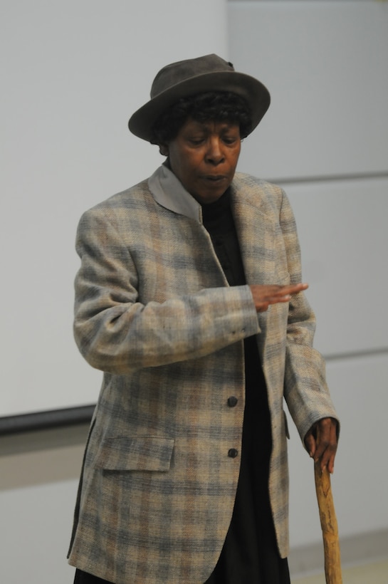 Actress Cynthia Maddox portrays Harriet Tubman, the most famous “conductor” on the Underground Railroad. Tubman helped lead hundreds of slaves to freedom and also served as a nurse, scout and spy during the Civil War. The 75th Training Command conducted a Black History Month and Women’s History Month observance Feb. 20, 2016, at Fort Sheridan, Ill. (Photo by Spc. David Lietz)
