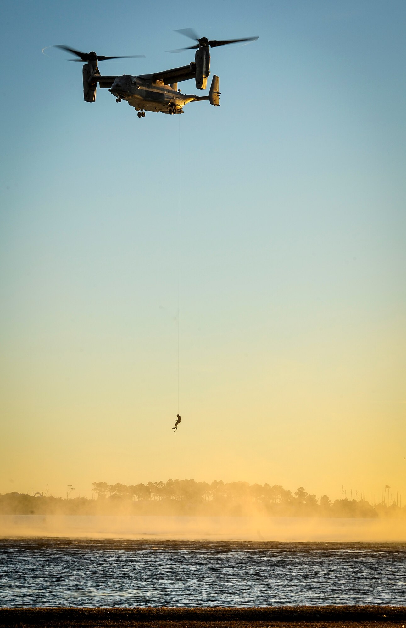 A pararescueman with the 24th Special Operations Wing repels from a 8th Special Operations Squadron CV-22B Osprey during a demonstration at Hurlburt Field, Fla., Feb. 18, 2016. The demonstration showcased Air Force Special Operations Command capabilities for the John L. Hennessy Award evaluators as Hurlburt Field was named top nominee for the award. The Hennessy Award recognizes the best food service programs in the Air Force, as well as individual excellence. (U.S. Air Force photo by Senior Airman Meagan Schutter)