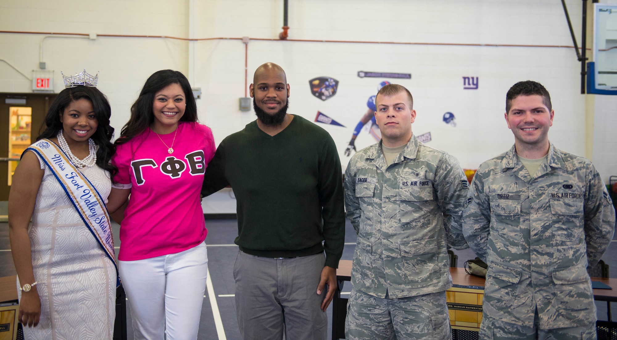 Guest speakers from Moody Youth Programs, “Teens Preparing for the Real World” seminar pose for a photo, Feb. 20, 2016, at Moody Air Force Base, Ga. Prior MYP members and base personnel spoke to teens about challenges they’ve faced becoming independent adults and shared success stories. (U.S. Air Force photo by Airman 1st Class Greg Nash/Released)  