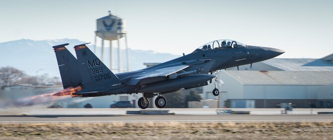 An F-15E Strike Eagle takes off on the flightline at Mountain Home Air Force Base, Idaho, Feb. 23, 2016. The F-15E Strike Eagle took off during a training exercise with the F-35As. (U.S. Air Force photo by Airman Chester Mientkiewicz/Released)