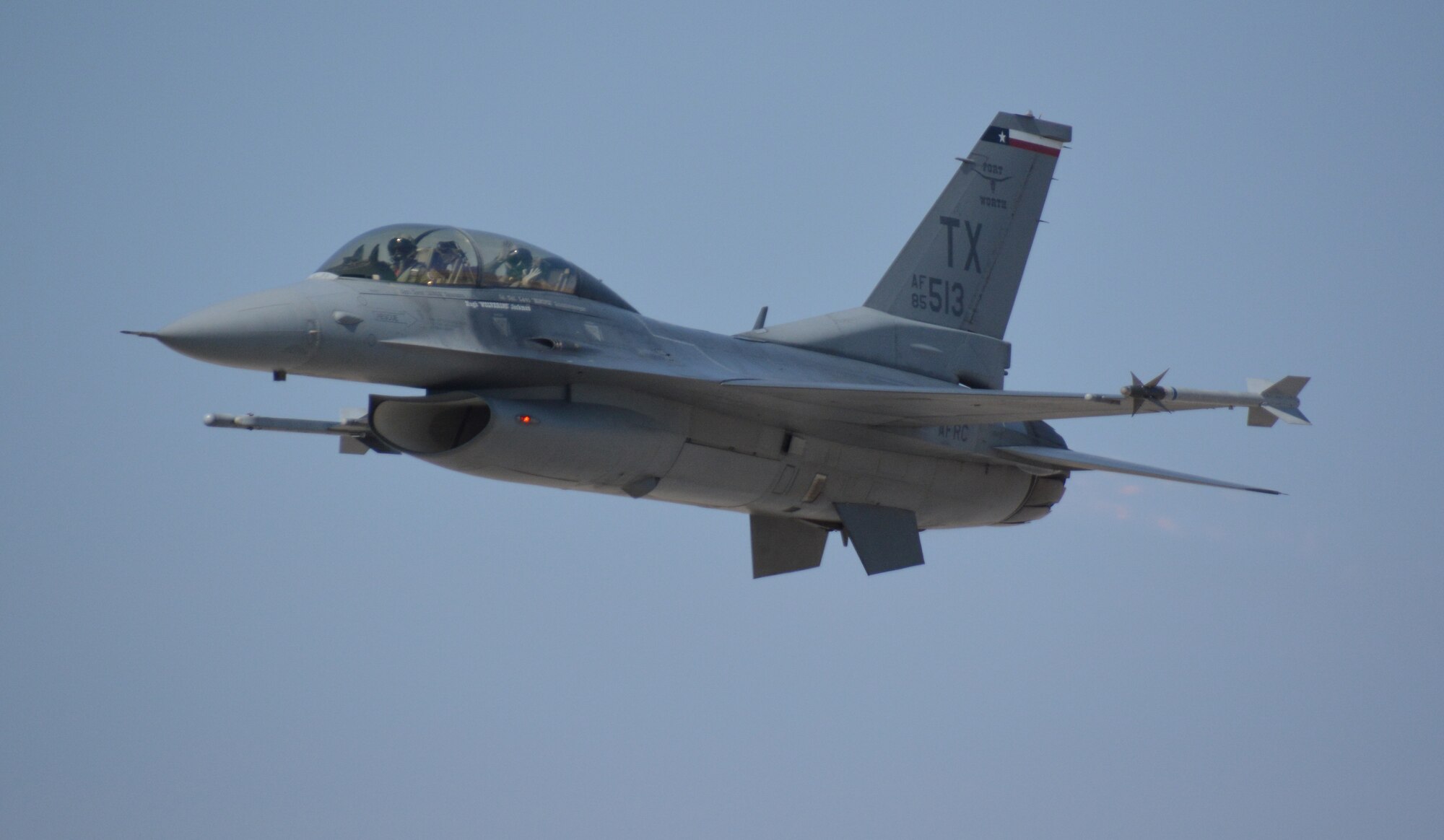 NAVAL AIR STATION FORT WORTH JOINT RESERVE BASE, Texas – Hugh Jackman, “Eddie the Eagle” star, rides in an F-16 here piloted by Lt. Col. David Efferson, 457th Fighter Squadron commander, Feb. 19. Jackman experienced a few aerial maneuvers which included a spiral dive from 8,000 feet and a low pass over the runway. (U.S. Air Force photo by Staff Sgt. Samantha Mathison)