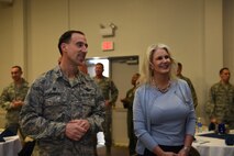Col. Leonard Kosinski, 62nd Airlift Wing Commander, stands next to his new Honorary Commander Anne Sprute, retired U.S. Army Aviator and founder of Rally Point 6, during the Team McChord Honorary Commander change of command at the Chapel Support Center Feb. 22, 2016, at Joint Base Lewis-McChord, Wash. The Honorary Commander program is an Air Force public affairs initiative to educate community partners with limited knowledge about the Air Force by teaming them up with commanders at Air Force bases. (U.S. Air Force photo/Staff Sgt. Naomi Shipley)