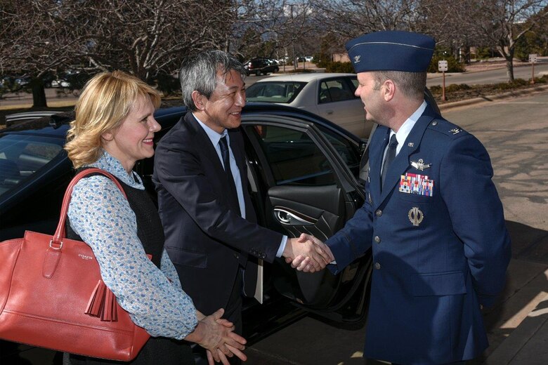 PETERSON AIR FORCE BASE, Colo. – Col. Douglas Schiess, 21st Space Wing commander, greets the Consul General of Japan in Denver, Makoto Ito, and his wife Grace on Feb. 17, 2016 at the Peterson Club. Peterson, in coordination with the Consul General of Japan in Denver, hosted a special event honoring service members and their families, both active and former, who once served in Japan. This event served as a reminder of the strong partnership we share with our allies in Japan, both overseas and stateside. (U.S. Air Force photo by Craig Denton)