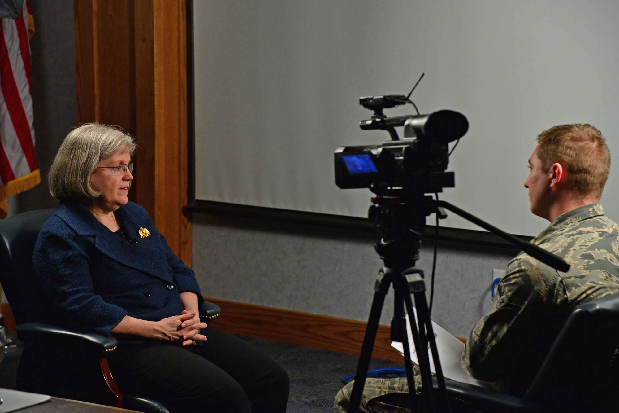 Holly Petraeus, Assistant Director of the Consumer Financial Protection Bureau, sits for an interview with Airman Collin Schmidt, 341st Missile Wing Public Affairs photojournalist, Feb. 23, 2016, at Malmstrom Air Force Base, Mont. Petraeus discussed the purpose of the CFPB and all the benefits it provides to service members. (U.S. Air Force photo/Airman Daniel Brosam)