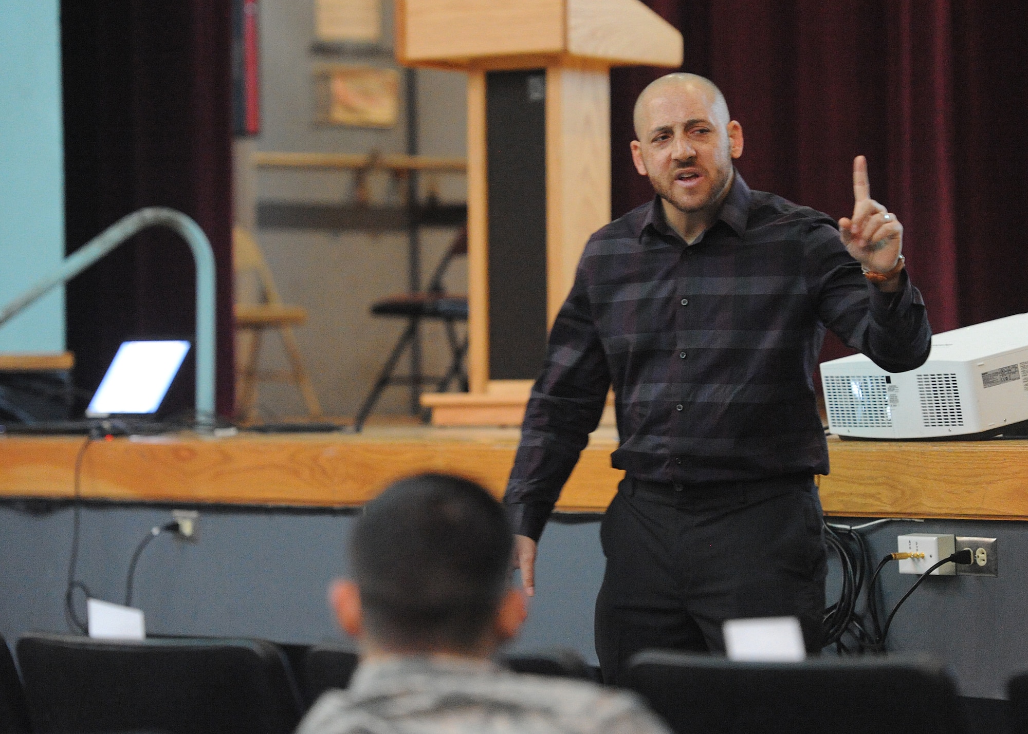Kevin Hines, a mental health advocate and motivational speaker, shares his story of struggling with mental health issues, and his miraculous survival of a suicide attempt  during a presentations Feb. 23 at the Base Theater. Hines held four sessions over two days sharing his message of inspiration and hope.  He encouraged Team Kirtland members to be good Wingmen by looking out for each other. (Photo by Todd Berenger)

