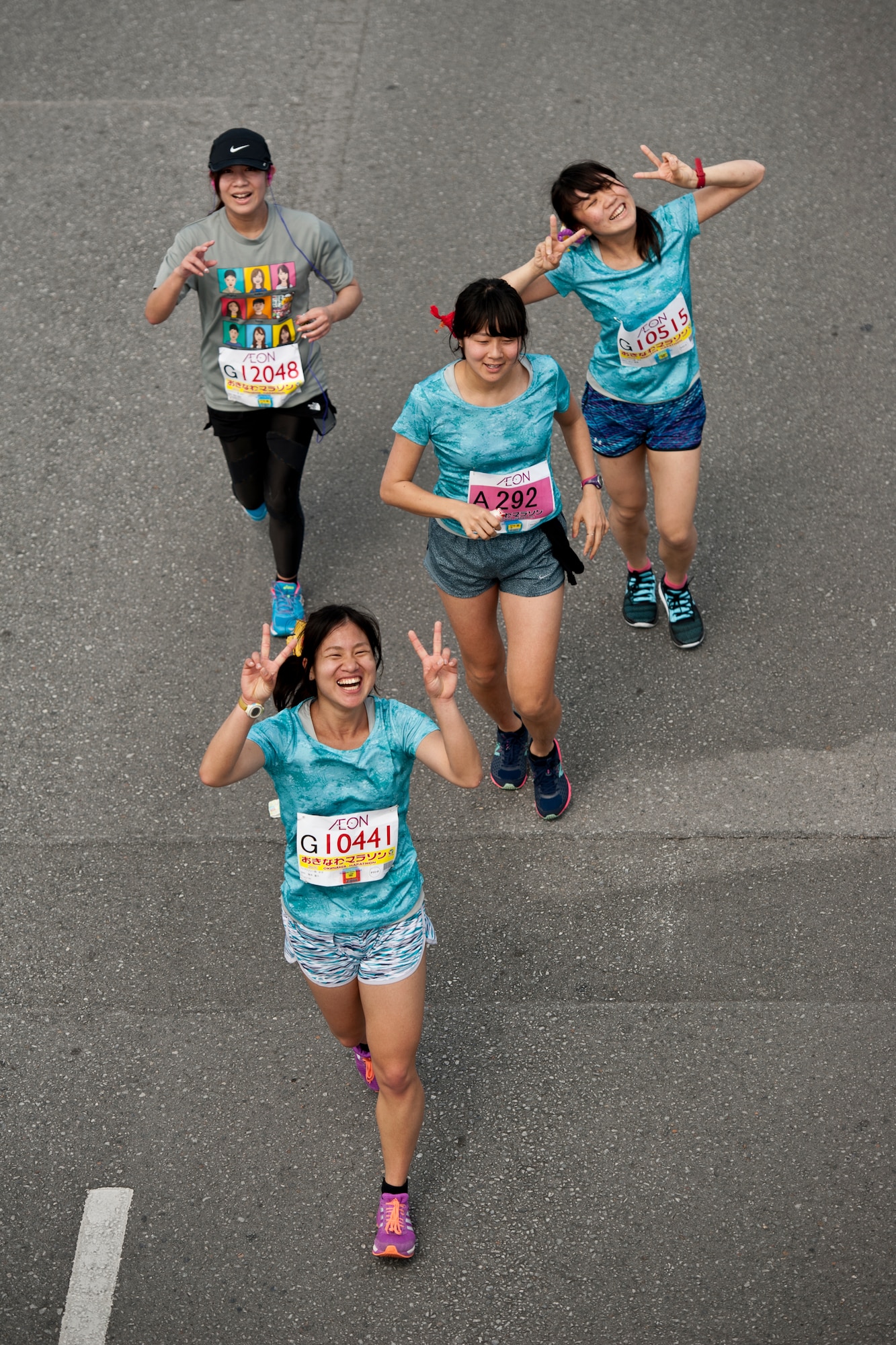 Marathon runners reach the 31-kilometer mark during the Okinawa Marathon Feb. 21, 2016 at Kadena Air Base, Japan. The annual Okinawa Marathon is one of two full marathons in Okinawa, covering a distance of 42.195 kilometers. (U.S. Air Force photo by Senior Airman Peter Reft)