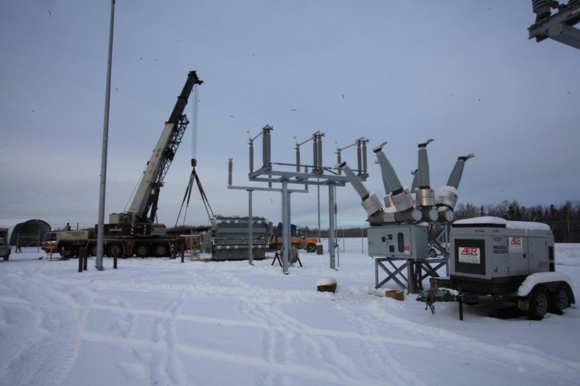 The Air Force Civil Engineer Center recently completed an energy conservation investment project at Clear Air Force Station, Alaska. The ECIP connected the Alaskan transmission network using a newly-constructed electrical substation, and added a grid-powered heat plant and additional backup power. Previously powered exclusively by a 53-year-old coal-fired plant on site, cost avoidance from modernization and cost savings in operations, maintenance, labor and fuel will save the Air Force approximately $2.6 million in fiscal 2016 and $1.9 million each year after — meaning the $23.5 million ECIP will pay for itself in savings in less than five years.  (Photo courtesy of U.S. Corps of Engineers)