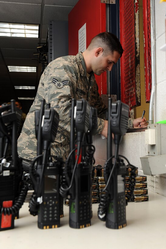 U.S. Air Force Senior Airman Jared Brubaker, 633rd Security Forces Squadron armorer, checks inventory at Langley Air Force Base, Va., Feb. 17, 2016. Armorers take inventory for all of the equipment that is kept in the armory each day to ensure all equipment is accounted for at the end of each shift change. (U.S. Air Force photo by Senior Airman Brittany E. N. Murphy)