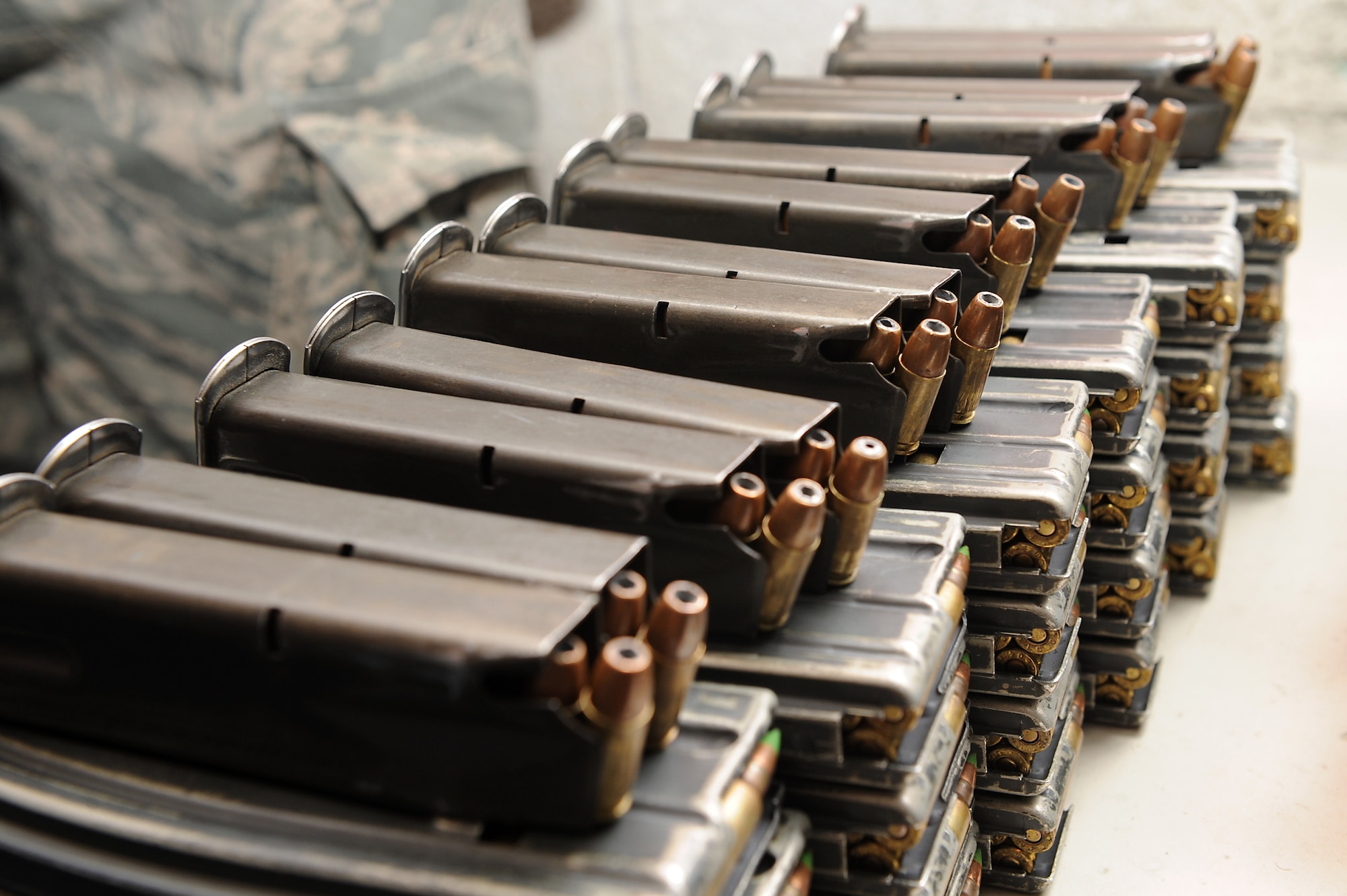 The 633rd Security Forces Squadron armory provides approximately 50 Service members daily with the vital weapons and equipment needed to guard and defend Langley Air Force Base. The SFS armory checks all ammunition to make sure it is accounted for during shift changes. (U.S. Air Force photo by Senior Airman Brittany E. N. Murphy)
