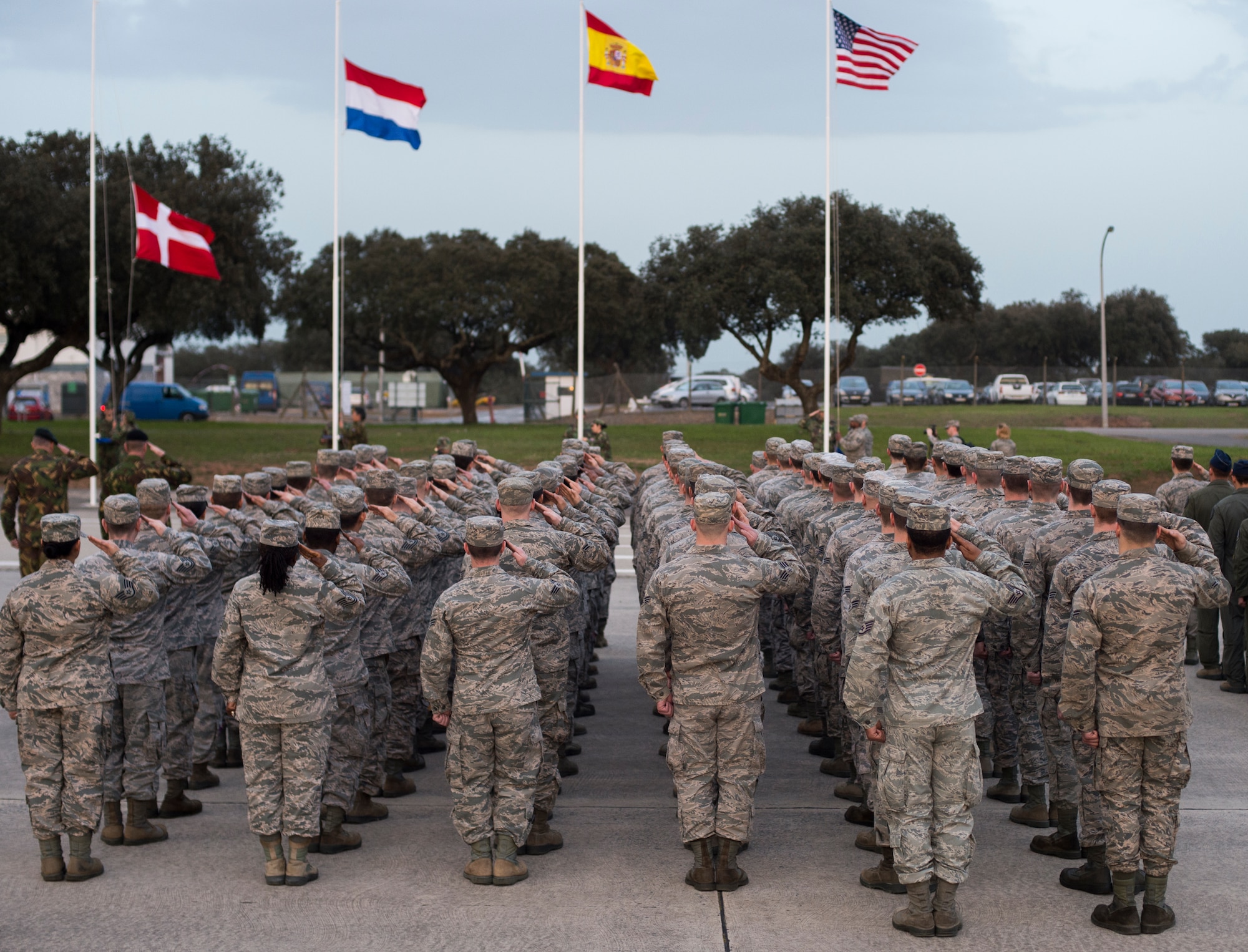 U.S. Airmen along with their international counterparts salute during the opening ceremony of exercise Real Thaw 16 in Beja, Portugal, Feb. 21, 2016. Real Thaw 16 is a Portuguese- hosted NATO exercise that provides tactical training to multiple participating nations. Its aim is to merge and employ different aerial platforms towards one major objective, covering a vast range of activities to include Defensive and Offensive Counter Air Operations, High Value Air Assets Protection and a Slow Mover Protection. Approximately 3,500 service members throughout Europe and the U.S. are participating in the event. (U.S. Air Force photo/Senior Airman Jonathan Stefanko)