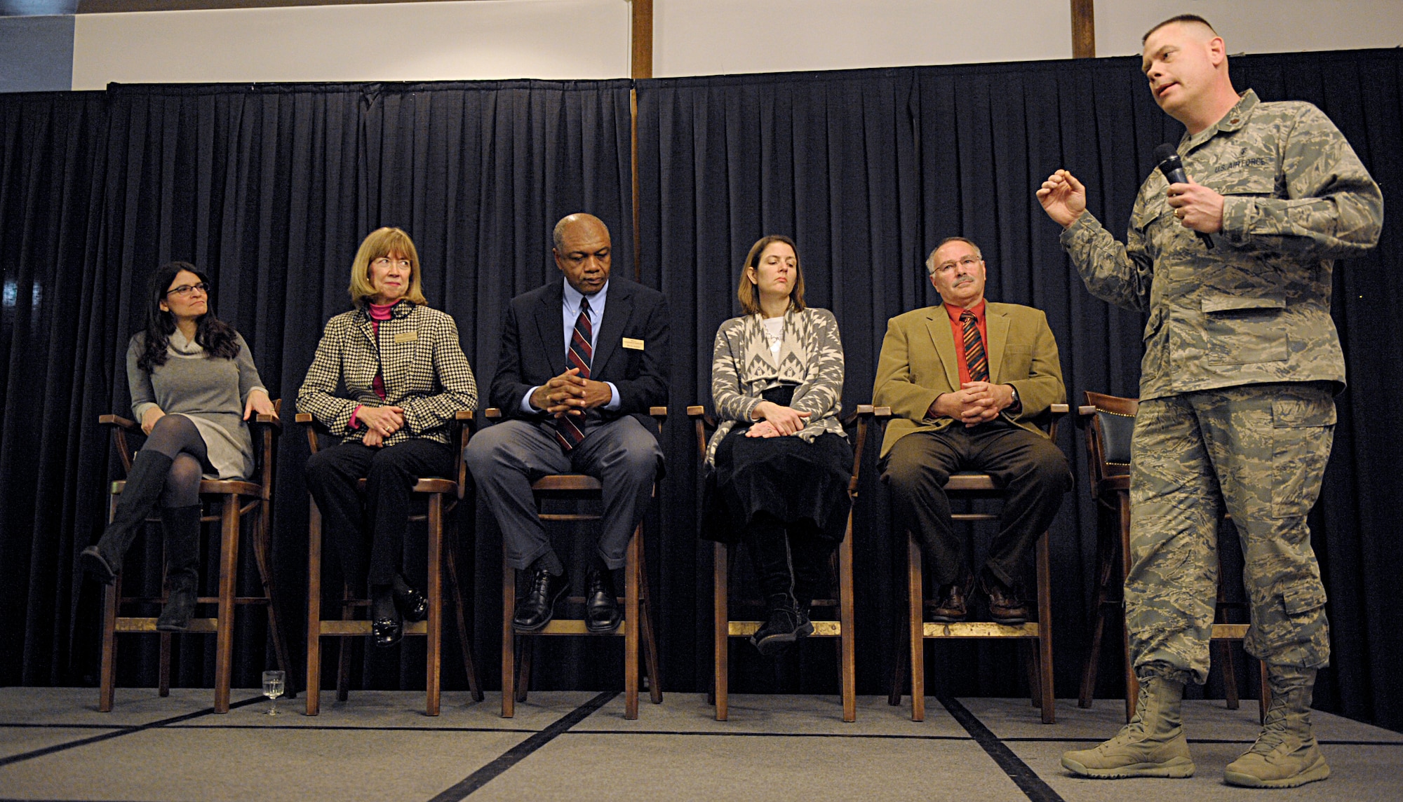 Maj. Matthew Pfeiffer, 86th Medical Squadron nursing supervisor, answers   a question about finances during the panel discussion of Military Saves Week kickoff Feb. 19, 2016, at Ramstein Air Base, Germany. Pfeiffer gave his personal experience and knowledge as an active duty service member as he and personal financial counselors answered questioned during the panel. The counselors are set to teach more than 20 classes during the week. The theme for the 2016 Military Saves Week is “Make Saving Automatic.” (U.S. Air Force photo/Staff Sgt. Timothy Moore)