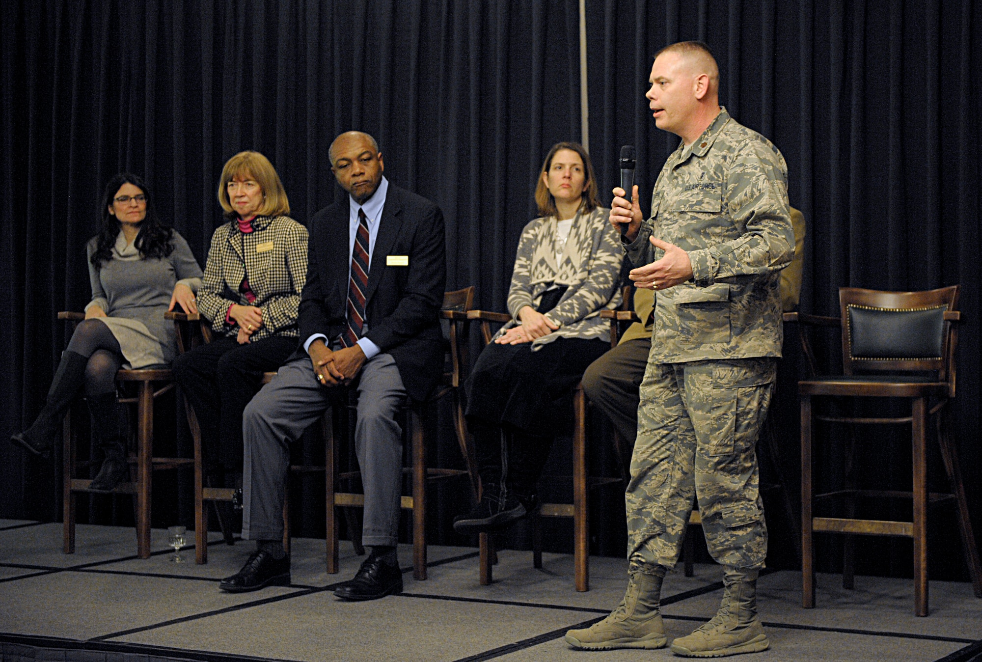 Maj. Matthew Pfeiffer, 86th Medical Squadron nursing supervisor, answers   a question about finances during the panel discussion of Military Saves Week kickoff Feb. 19, 2016, at Ramstein Air Base, Germany. Pfeiffer gave his personal experience and knowledge as an active duty service member as he and personal financial counselors answered questioned during the panel. The counselors are set to teach more than 20 classes during the week. The theme for the 2016 Military Saves Week is “Make Saving Automatic.” (U.S. Air Force photo/Staff Sgt. Timothy Moore)