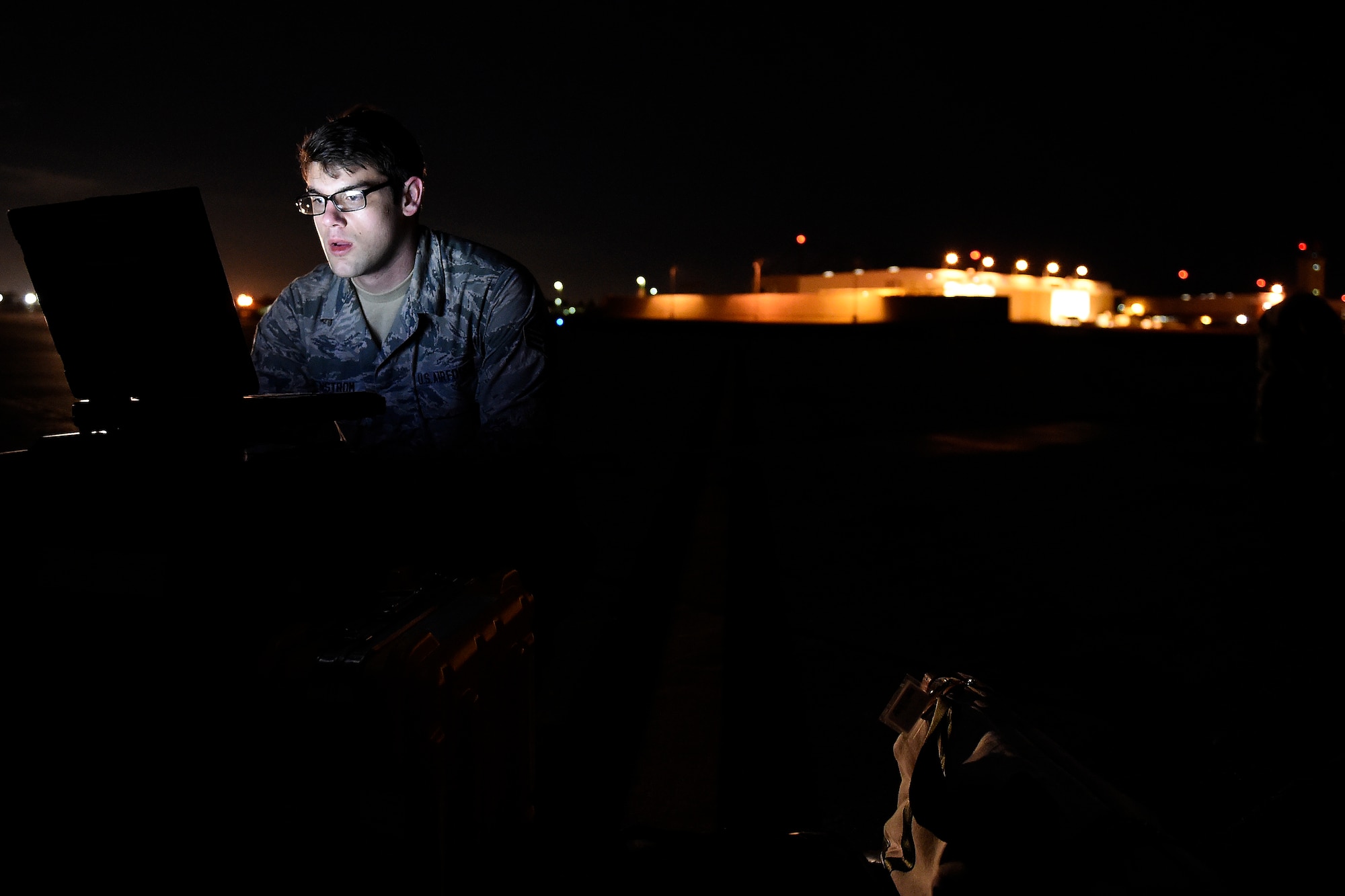 Senior Airman Jacob Remstrom, 62nd Maintenance Squadron hydraulics systems specialist, prepares to work on a C-17 Globemaster , Feb. 18, 2016 at North Island Naval Station, Calif. Remstrom was part of a four person McChord Maintenance Recovery Team sent from Joint Base Lewis-McChord, Wash. (U.S. Air Force photo/Tech Sgt. Tim Chacon)