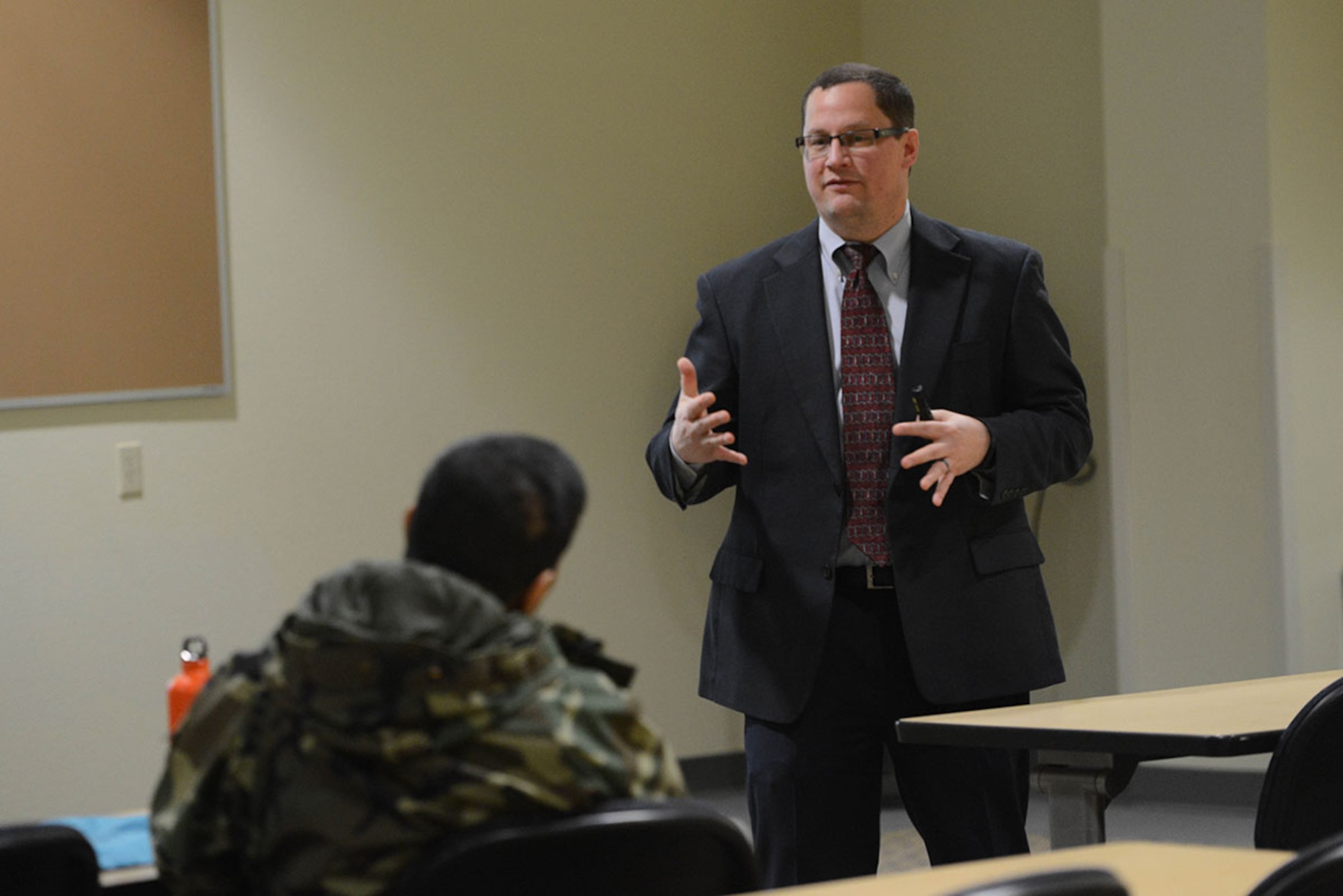 Detective Mark Thomas speaks to parents during an internet safety class for teens and parents at the Joint Base Elmendorf-Richardson Education Center, Feb. 19. The Anchorage Police Department’s Alaska Internet Crimes Against Children Taskforce, gave a presentation they provide regularly throughout the Anchorage community. (U.S Air Force photo by Airman 1st Class Javier Alvarez)