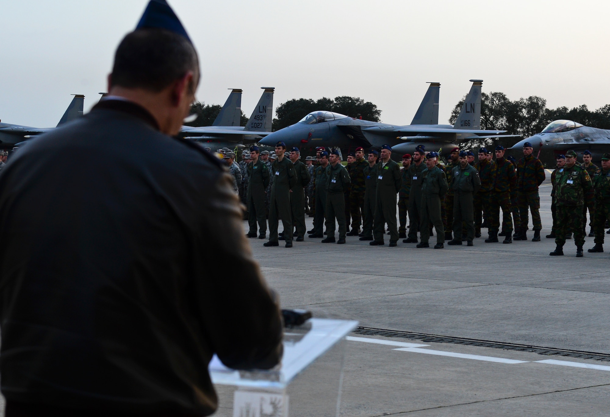 Brig. Gen. Barros Ferreira, Portuguese air force director of operations, speaks to U.S. Airmen as well as NATO and other ally forces during the opening ceremony for Real Thaw 2016 at Beja Air Base, Portugal, Feb. 21, 2016. RT16, taking place from February 22-March 3, is an exercise planned and conducted by the Portuguese air force, under the aegis of its Air Command, who are responsible for training and readying the operational units, through air operations in the defense of national interests, as well as through the participation in military operations in several international cooperation frameworks.  (U.S. Air Force photo by Senior Airman Dawn M. Weber/Released)