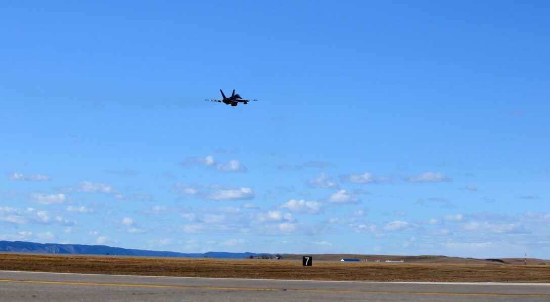 An F/A-18F Super Hornet takes off from Ellsworth Air Force Base, S.D., Feb. 19, 2016. Eleven Super Hornets from the Strike Fighter Squadron Three Two (VFA-32 Swordsmen) at Naval Air Station Oceana, Va., made an operational stop at Ellsworth on their way back to Virginia after completing a training exercise near NAS Fallon in Nevada. (U.S. Air Force photo by Tech. Sgt. R. Michael Longoria/Released)