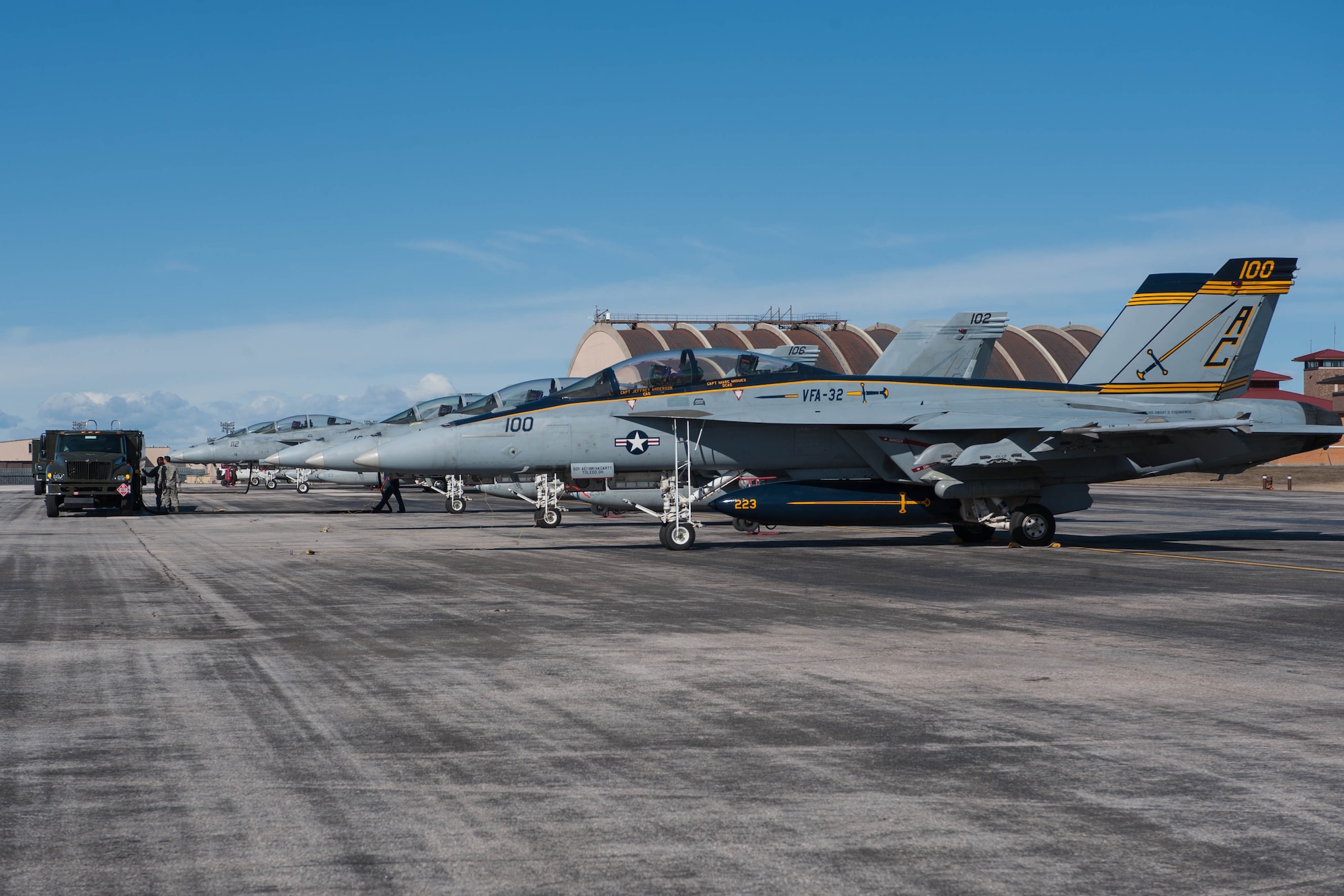 Airmen from the 28th Logistics Readiness Squadron refuel F/A-18F Super Hornets on the flightline at Ellsworth Air Force Base, S.D., Feb. 19, 2016. Eleven Super Hornets from the Strike Fighter Squadron Three Two (VFA-32 Swordsmen) at Naval Air Station Oceana, Va., made an operational stop at Ellsworth on their way back to Virginia after completing a training exercise near NAS Fallon in Nevada. (U.S. Air Force photo by 1st Lt. Rachel Allison/Released)