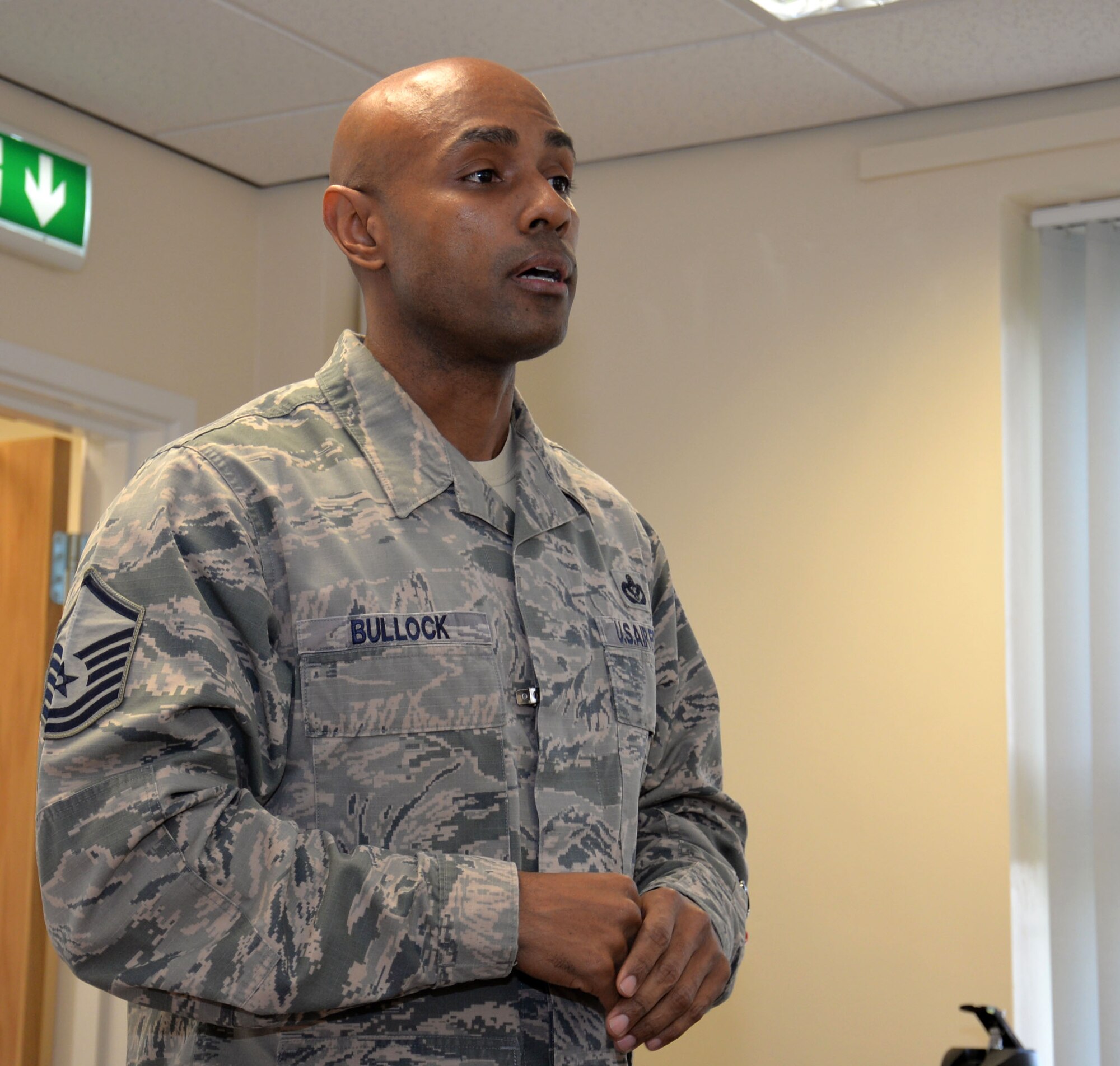 U.S. Air Force Master Sgt. Dion Bullock, 100th Air Refueling Wing readiness inspections superintendent, discusses the topics during a National Incident Management System 300/400 course Feb. 18, 2016, on RAF Mildenhall, England. This training was intended to aid people who don't usually work together, or even know each other, to seamlessly respond to and recover from a disaster, either natural or man-made. (U.S. Air Force photo by Gina Randall/Released)