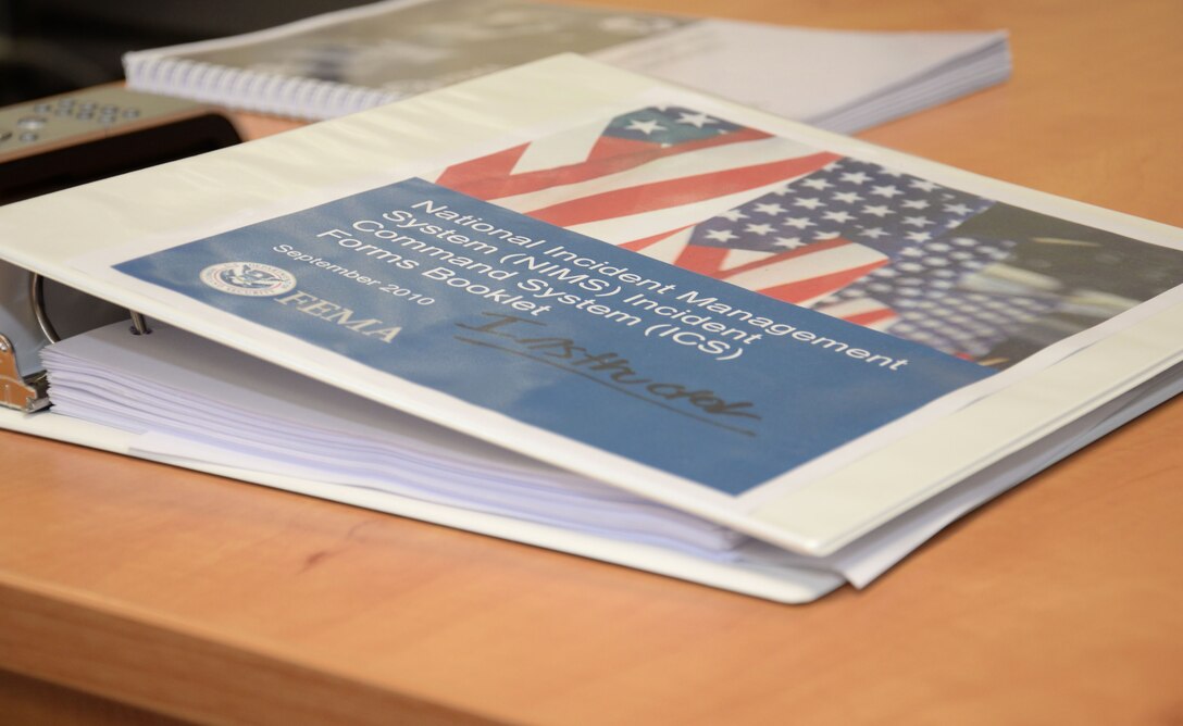 Course material is ready for use during a National Incident Management System 300/400 course Feb. 18, 2016, on RAF Mildenhall, England. The course is primarily conducted at the U.S. Air Force Louis F. Garland Fire Academy at Goodfellow Air Force Base, Texas, approximately eight to 10 times a year. (U.S. Air Force photo by Gina Randall/Released)