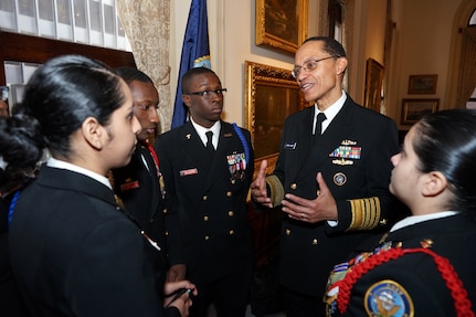 U.S. Navy Adm. Cecil D. Haney, U.S. Strategic Command (USSTRATCOM) commander (center right), speaks with Navy Junior Reserve Officer Training Corps (JROTC) cadets from Proviso-West High School after providing the keynote speech at an event hosted by the Adm. Hyman G. Rickover Leadership Series at the Union League Club of Chicago, Chicago, Ill., Feb. 23, 2016. Haney discussed leadership and challenged the cadets to be &ldquo;brave, bold and develop a questioning attitude,&rdquo; The purpose of the Rickover Leadership Series is to enhance the education, awareness and appreciation of Chicago Public Schools JROTC cadets in the social, political, and cultural dimensions of the nation and the world. Haney also visited with cadets, faculty, and staff at Rickover Naval Academy in Chicago. One of nine DoD unified combatant commands, USSTRATCOM has global strategic missions, assigned through the Unified Command Plan, which include strategic deterrence; space operations; cyberspace operations; joint electronic warfare; global strike; missile defense; intelligence, surveillance and reconnaissance; combating weapons of mass destruction; and analysis and targeting. (U.S. Navy photo by Lt. Cmdr. Jeffrey S. Gray)