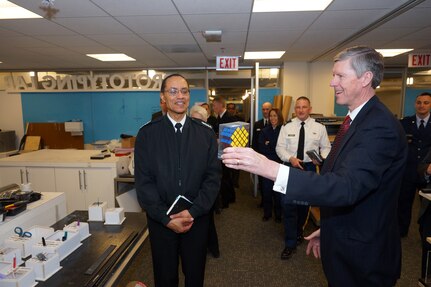 Dennis Roberson, Illinois Institute of Technology vice provost research professor in computer science (right), introduces U.S. Navy Adm. Cecil D. Haney, U.S. Strategic Command (USSTRATCOM) commander, to the extra hard X-Cube puzzle game invented by one of the schoolâ€™s undergraduates during a tour of the schoolâ€™s Idea Shop in Chicago, Ill., Feb. 23, 2016. The Idea Shop was developed in 2010 and to provide students with a &ldquo;workplace and learning space that inspires interaction across professional programs and elevates the entire educational experience,&rdquo; according to the shopâ€™s website. While in Chicago, Haney also attended the Adm. Hyman G. Rickover Leadership Series at the Union League Club of Chicago and spoke with cadets, faculty and staff at the Rickover Naval Academy. One of nine DoD unified combatant commands, USSTRATCOM has global strategic missions, assigned through the Unified Command Plan, which include strategic deterrence; space operations; cyberspace operations; joint electronic warfare; global strike; missile defense; intelligence, surveillance and reconnaissance; combating weapons of mass destruction; and analysis and targeting. (U.S. Navy photo by Lt. Cmdr. Jeffrey S. Gray)