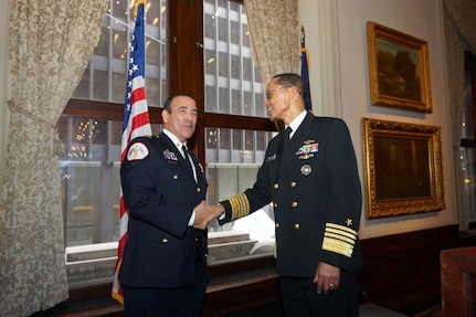 U.S. Navy Adm. Cecil D. Haney, U.S. Strategic Command (USSTRATCOM) commander (right), shakes hands with Chicago Fire Commissioner Jose Santiago after an event hosted by the Adm. Hyman G. Rickover Leadership Series at the Union League Club of Chicago, Chicago, Ill., Feb. 23, 2016. In his keynote address, Haney discussed leadership and challenged Navy Junior Reserve Officer Training Corps (JROTC) cadets to be &ldquo;brave, bold and develop a questioning attitude,&rdquo; The purpose of the Rickover Leadership Series is to enhance the education, awareness and appreciation of Chicago Public Schools JROTC cadets in the social, political, and cultural dimensions of the nation and the world. Haney also visited with cadets, faculty, and staff at the Rickover Naval Academy in Chicago. One of nine DoD unified combatant commands, USSTRATCOM has global strategic missions, assigned through the Unified Command Plan, which include strategic deterrence; space operations; cyberspace operations; joint electronic warfare; global strike; missile defense; intelligence, surveillance and reconnaissance; combating weapons of mass destruction; and analysis and targeting. (U.S. Navy photo by Lt. Cmdr. Jeffrey S. Gray)