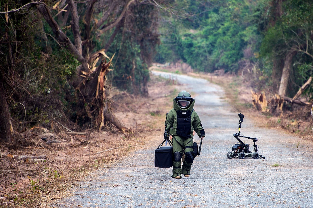 A Navy explosive ordnance disposal technician conducts counter improvised explosive device training with a robot during Cobra Gold 2016 in Thailand, Feb. 17, 2016. Cobra Gold brings together more than two dozen nations to promote international cooperation and stability within the region. Navy photo by Petty Officer 2nd Class Daniel Rolston