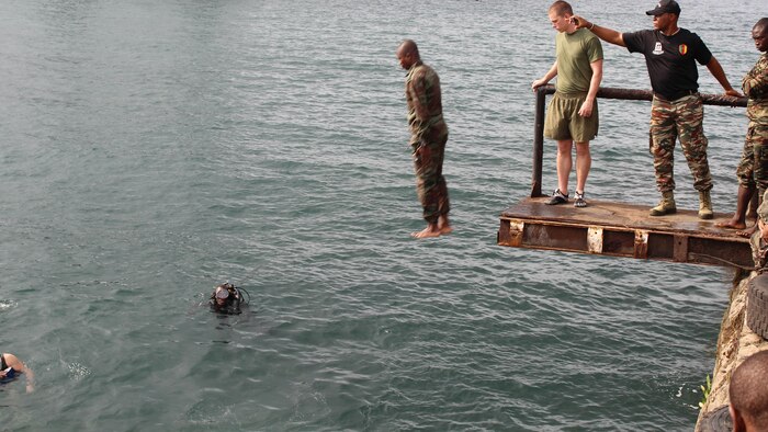U.S. Marines and sailors are working with Cameroon’s Fusiliers Marins and Compagnie des Palmeurs de Combat to increase their capabilities to combat illicit activity and increase security in the waterways and borders of Cameroon. At the request of the Cameroonian government and through coordination with the U.S. Embassy in Yaounde, Marines and sailors with Special-Purpose Marine Air-Ground Task Force Crisis Response-Africa, are partnering with their military counterparts in infantry tactics in support of their maritime security force capabilities. 