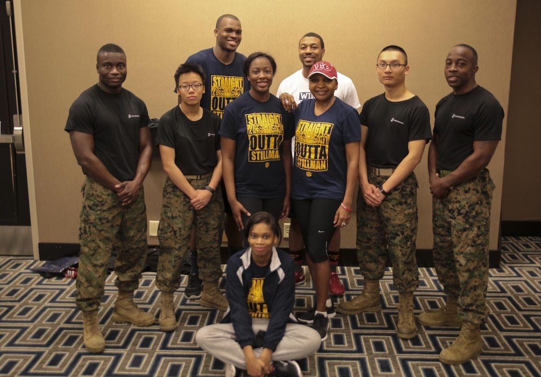 Marines and students pose for a photo after the Wake Up and Work Out event at Hyatt Regency Hotel in New Orleans La, Feb. 20, 2016. Wake Up and Work Out is part of the Empower Me Tour, a partnership between the Marine Corps and the United Negro College Fund to increase awareness among college and high school students to consider service in the Marine Corps as a career option. (U.S Marine Corps Photo by Cpl. Ian Ferro)