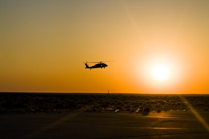 A UH-60 Black Hawk helicopter, piloted by West Virginia Army National Guard Soldiers from Company C, 2nd Battalion, 104th Aviation Regiment, fly Airmen from the 386th Expeditionary  Medical Group and medical staff from the Canadian Joint Task Force Support Component during a medevac training exercise at an undisclosed location in Southwest Asia on Feb. 18. The 386th EMDG and JTFSC trained with the 40th CAB in order to be as prepared as possible for medevac helicopters landing at the base. 