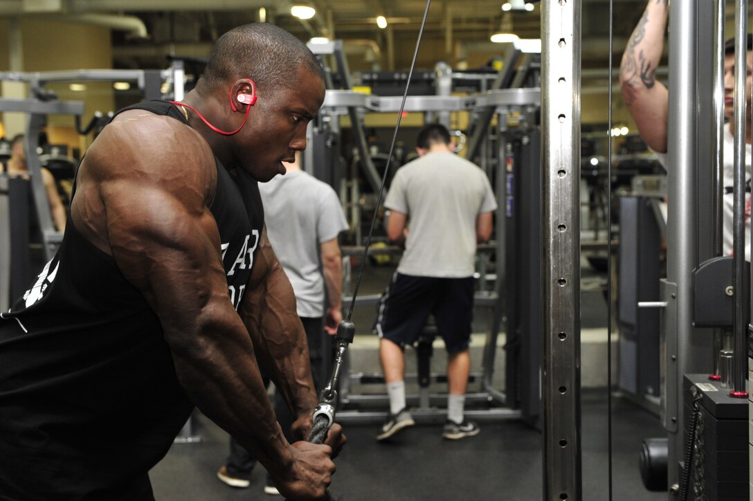 Staff Sgt. Robert Timms, 756th Aircraft Maintenance Squadron weapons lead crew team chief, performs a tricep rope pulldown Feb. 19, 2016 at EOS Fitness in Avondale, Ariz. Timms won first place and overall in Jon Lindsay’s Muscle Contest in the men’s classic physique category January 2016 in Las Vegas. 