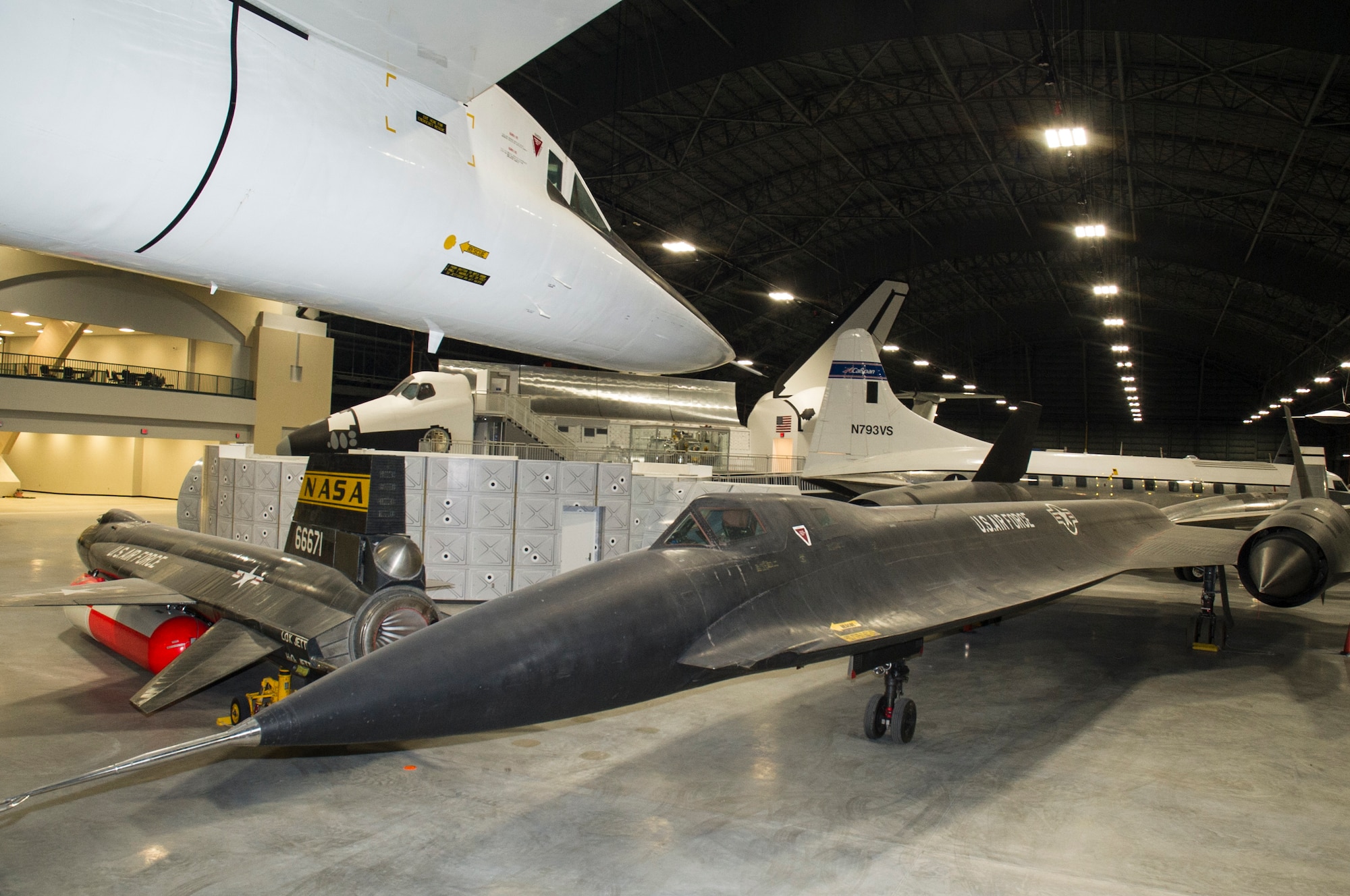 General view of the North American XB-70 Valkyrie and the Lockheed YF-12A in the Research and Development Gallery in the museum's fourth building. Also pictured are the North American X-15A-2 and the Space Shuttle Exhibit on display in the Space Gallery at the National Museum of the U.S. Air Force. (U.S. Air Force photo by Ken LaRock)