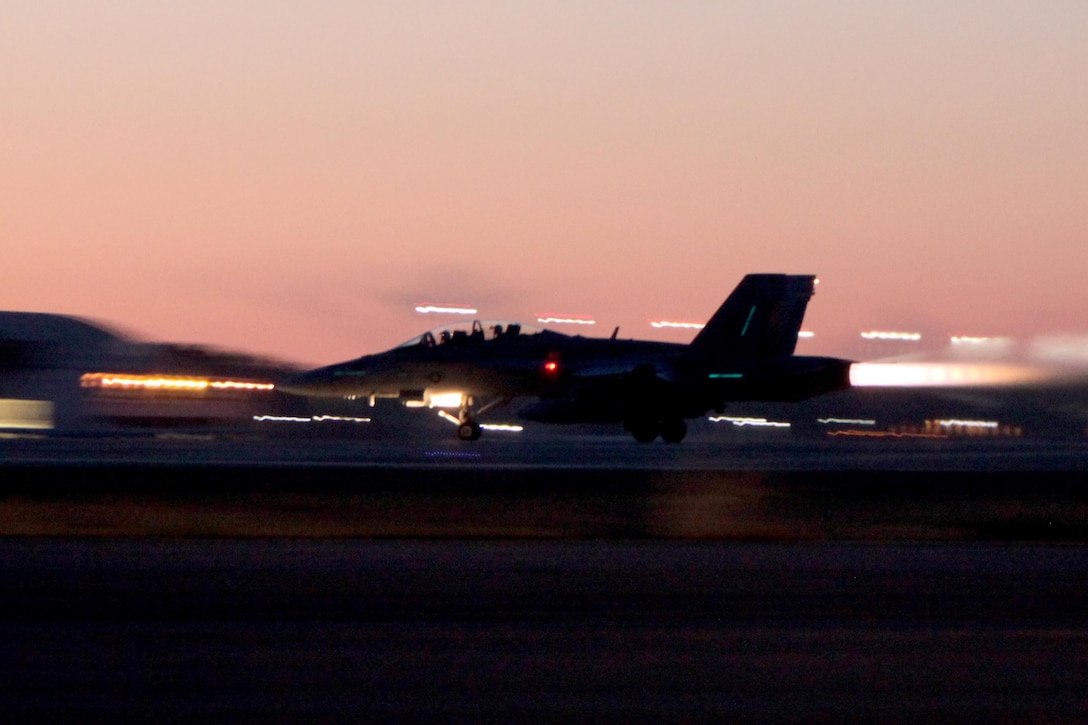 An F/A-18 Hornet accelerates prior to a takeoff during Exercise Coastal Predator at Marine Corps Air Station Cherry Point, N.C., Feb. 16, 2016. Coastal Predator is an exercise that included Marine Corps and Army aviation assets along with Air Force personnel and civilian contractors to conduct Forward Air Controller Airborne training in accordance with the pre-deployment training program.  (U.S. Marine Corps photo by Cpl. Jason Jimenez/Released)