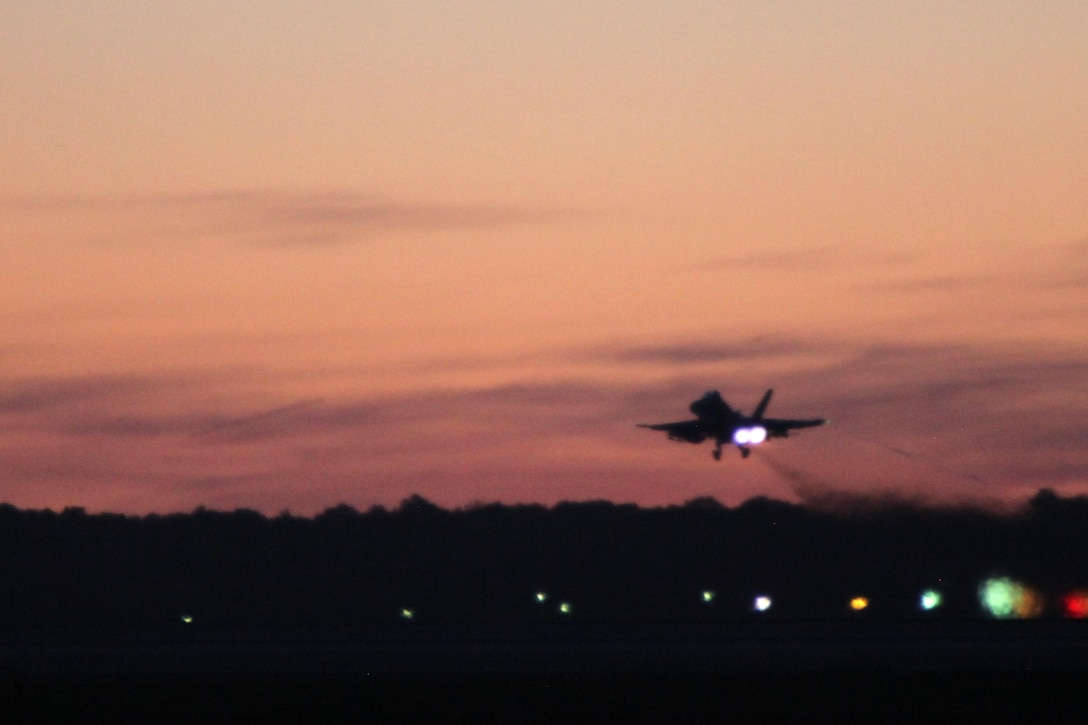 An F/A-18 Hornet takes off during Exercise Coastal Predator at Marine Corps Air Station Cherry Point, N.C., Feb. 16, 2016. Coastal Predator is an exercise that included Marine Corps and Army aviation assets along with Air Force personnel and civilian contractors to conduct Forward Air Controller Airborne training in accordance with the pre-deployment training program.  (U.S. Marine Corps photo by Cpl. Jason Jimenez/Released)