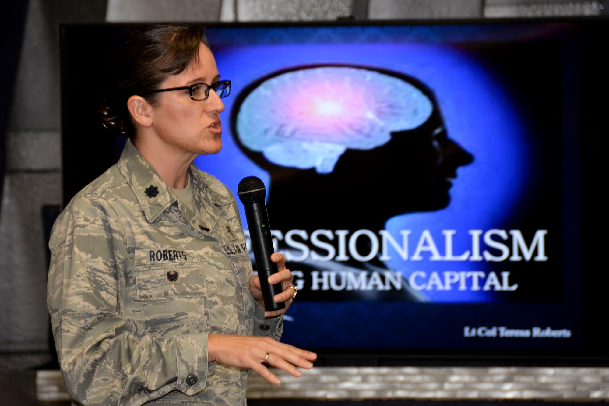 Lt. Col. Teresa Roberts, Profession of Arms Center of Excellence director of operations, kicks off the Impact of the Human Element Seminar at Barksdale Air Force Base, La., Feb. 16, 2016. PACE representatives visit various bases to encourage motivated individuals to become better people, and in turn, better leaders. (U.S. Air Force photo/Senior Airman Amanda Morris)
