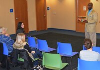 William Downey, the 80th Training Command Sexual Harassment/Assault Response and Prevention Program manager, discusses with advocates affiliated with The Regional Hospital Accompaniment Response Team the services available to military members who end up as sexual assault victims during a meeting at the Glen Allen Library.