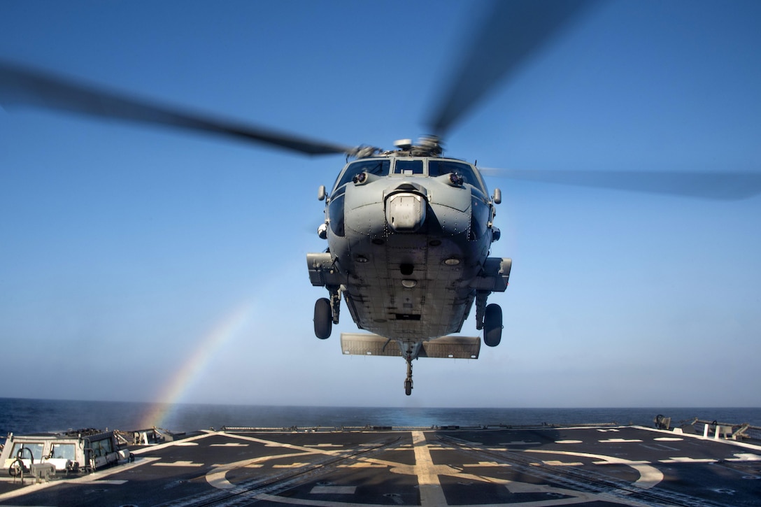 An MH-60R Seahawk helicopter lands on the flight deck of the guided-missile destroyer USS Chung-Hoon in the Philippine Sea, Feb. 23, 2016. The Chung-Hoon is on a regularly scheduled deployment in the U.S. 7th Fleet area of responsibility. U.S. Navy photo by Petty Officer 2nd Class Marcus L. Stanley