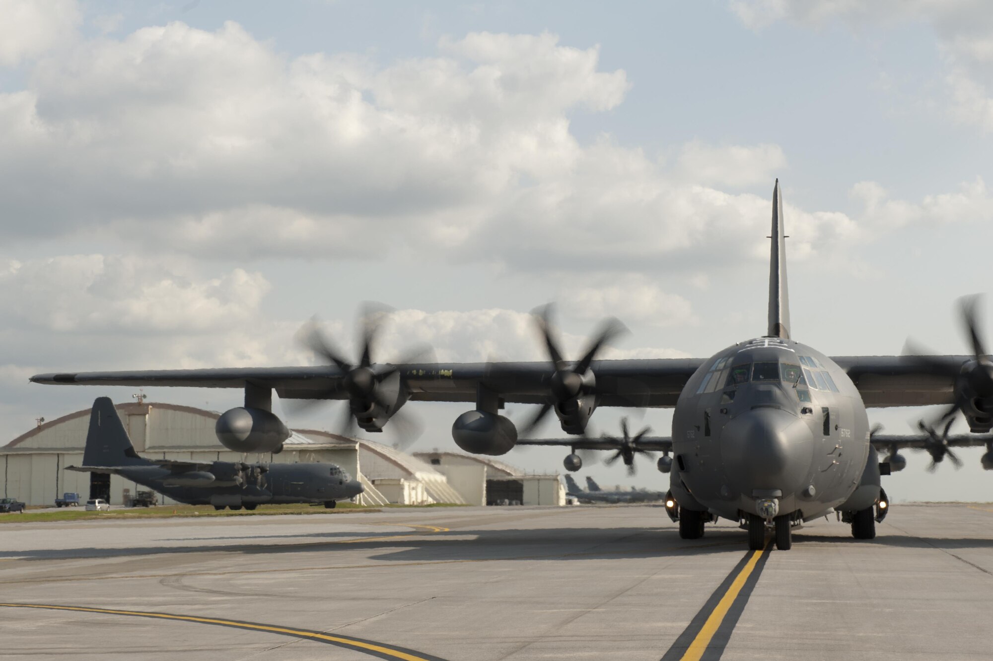 U.S. Air Force MC-130J Command IIs assigned to the 17th Special Operations Squadron taxi down the runway Feb. 17, 2016, at Kadena Air Base, Japan. The 17th SOS conducted a unit-wide training exercise which tasked the entire squadron with a quick-reaction, full-force sortie involving a five-ship formation flight, cargo drops, short runway landings and takeoffs, and helicopter air-to-air refueling. (U.S. Air Force photo by Senior Airman Peter Reft/Released)