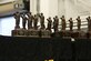 Trophies are displayed on a table during the 2015 Maintenance Professional of the Year banquet at Barksdale Air Force Base, La., Feb. 19, 2016. Airmen were nominated for awards based on their outstanding job performance throughout the previous year. (Courtesy photo)