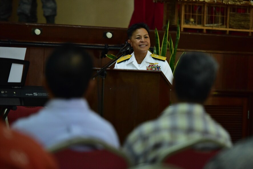 U.S. Navy Rear Adm. Bette Bolivar, Joint Region Marianas commander, speaks during a change of charge ceremony, held Feb. 19, 2016, at the Ngarachamayong Cultural Center, located in Palau’s Koror state. Airmen of CAT 554-01 provided construction capabilities, apprenticeship training, medical outreach and community engagement opportunities while deployed to the Republic of Palau. (U.S. Air Force photo by Staff Sgt. Christopher Stoltz/Released)