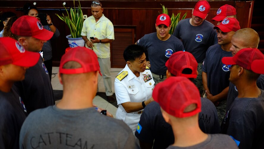 U.S. Navy Rear Adm. Bette Bolivar, Joint Region Marianas commander, speaks to Civil Action Team 554-01 after their change-of-charge ceremony, held Feb. 19, 2016, at the Ngarachamayong Cultural Center, located in Palau’s Koror state. Airmen of CAT 554-01, comprised of Airmen from the 554th RED HORSE Squadron and 36th Civil Engineer Squadron from Andersen Air Force Base, Guam, provided construction capabilities, apprenticeship training, medical outreach and community engagement opportunities while deployed to the Republic of Palau. (U.S. Air Force photo by Staff Sgt. Christopher Stoltz/Released)