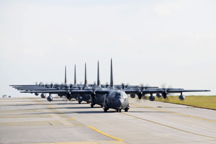 U.S. Air Force MC-130J Command II's assigned to the 17th Special Operations Squadron taxi down the runway Feb. 17, 2016, at Kadena Air Base, Japan. The 17th SOS conducted a unit-wide training exercise which tasked the entire squadron with a quick-reaction, full-force sortie involving a five-ship formation flight, cargo drops, short runway landings and takeoffs, and helicopter air-to-air refueling. 