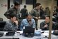 Airmen from the Japan Air Self-Defense Force, South Korean air force and Republic of Singapore Air Force participate in the command and control section of the final exercise of Partner Nation Silver Flag Feb. 19, 2016, at Andersen Air Force Base, Guam. The contingency environment training focused on bare-base bed down, sustainment operations and recovery after an attack. (U.S. Air Force photo/Senior Airman Joshua Smoot)