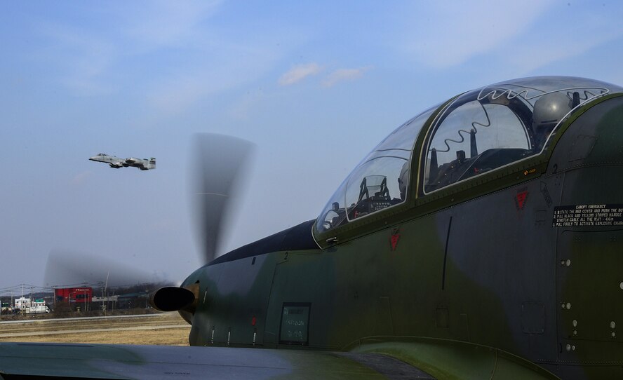 Pilots from the South Koreas air force’s 237th Fighter Squadron at Wonju Air Base watch an A-10 Thunderbolt II take off during Buddy Wing 16-2 on Osan Air Base, South Korea, Feb. 23, 2016. Buddy Wing 16-2 is the second in a series of joint training, combat exercises to be conducted during 2016 across the peninsula. The exercises strengthen the South Korean and U.S. alliance. (U.S. Air Force photo/Senior Airman Kristin High)